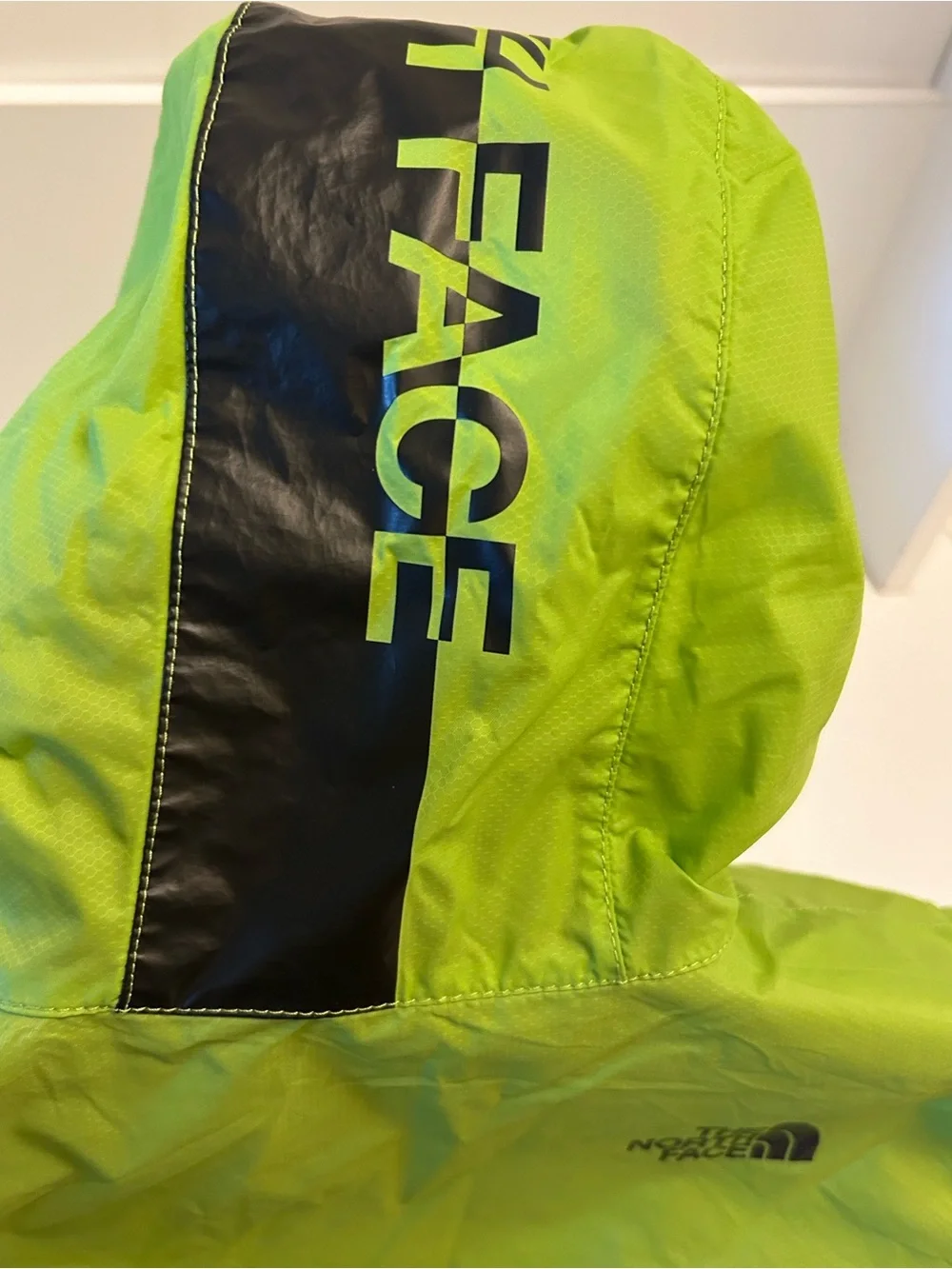 The North Face Kids Lime Green Hooded Windbreaker Jacket